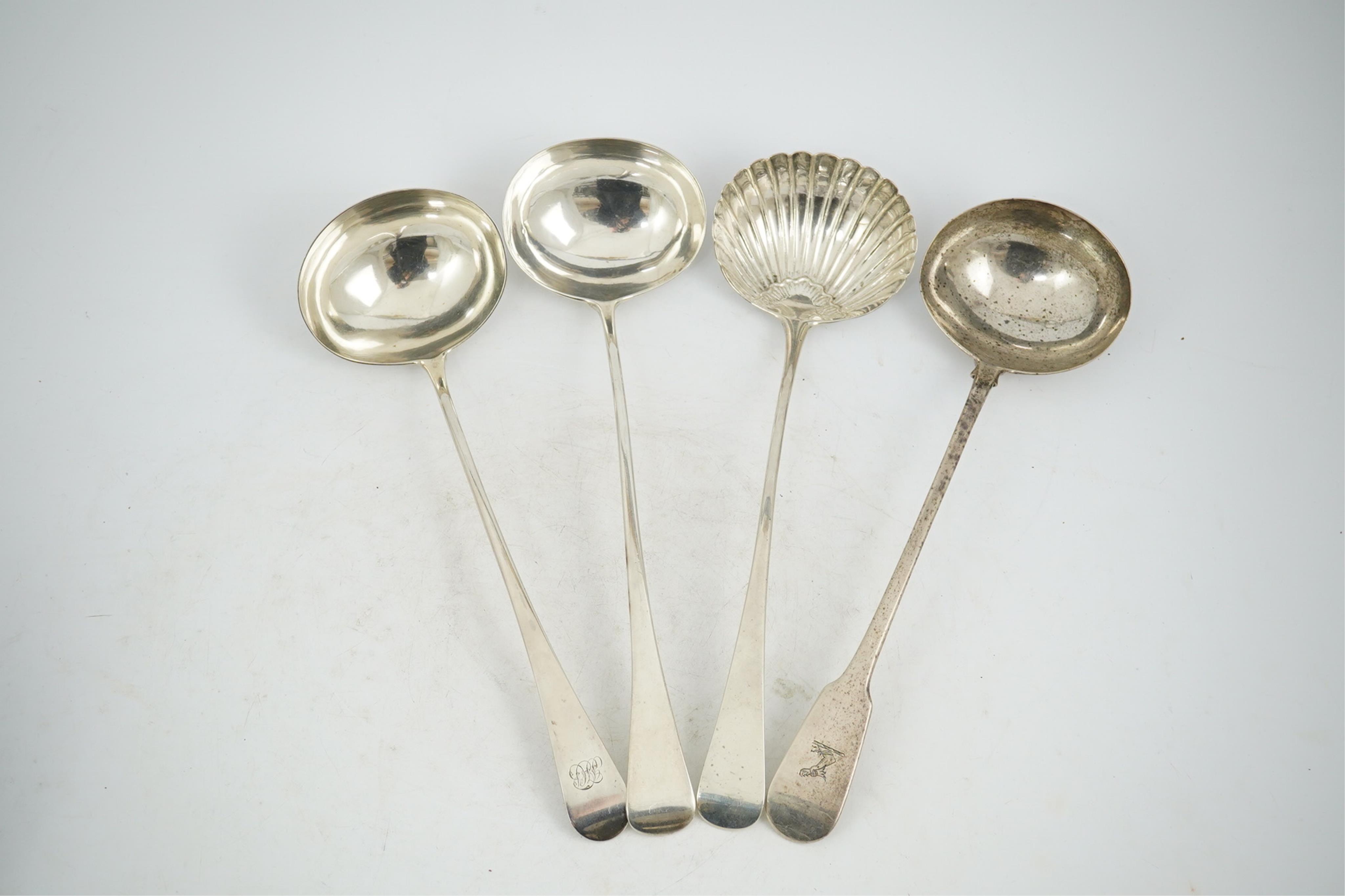 Three George III silver Old English pattern soup ladles, London, 1802, 1805 and 1808, various makers, together with a George IV silver fiddle pattern soup ladle by Eley & Fearn, London, 1821, 23oz.